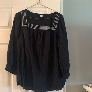 Black with white stitching long sleeved top